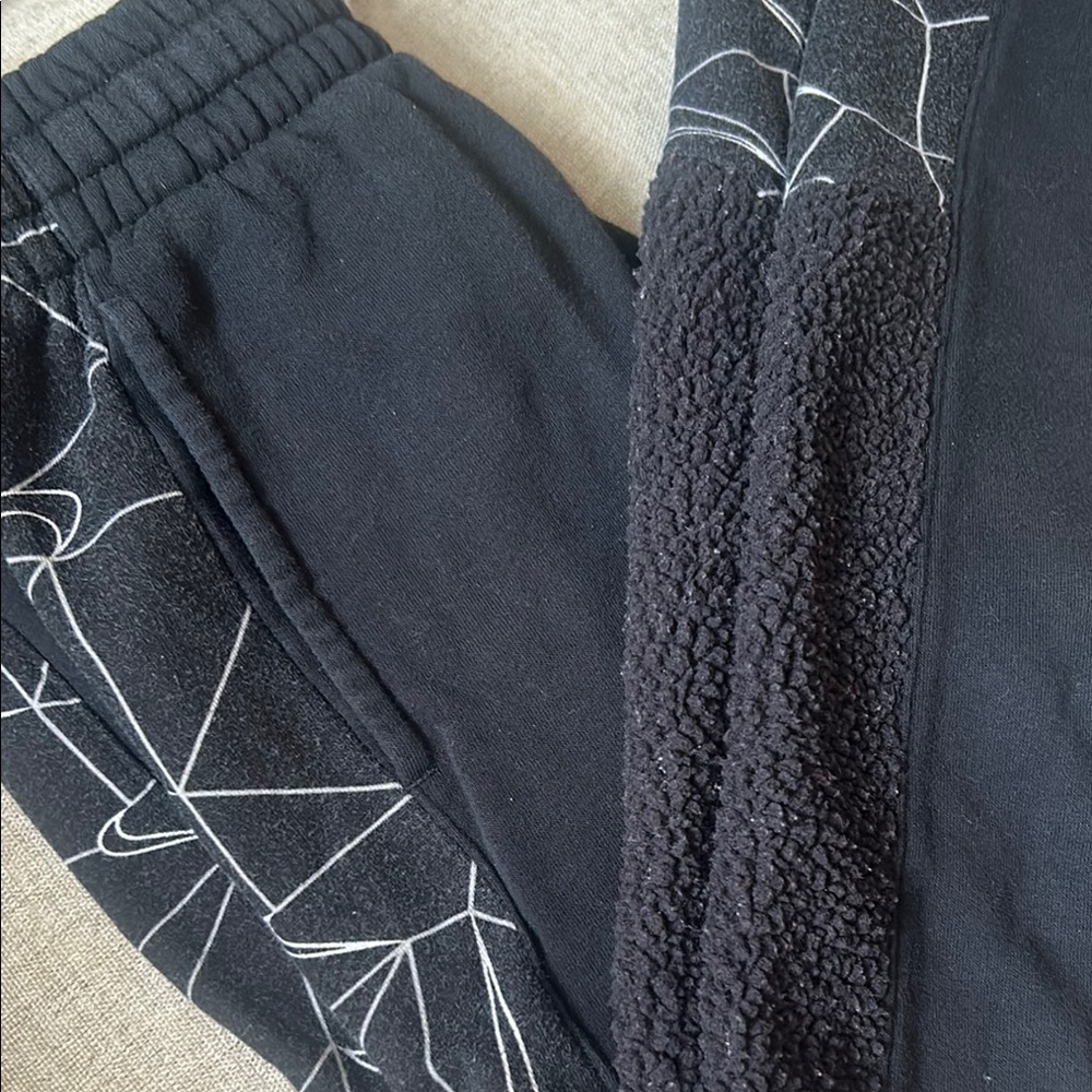 Nike Black Tapered Sweatpants with Geometric Design